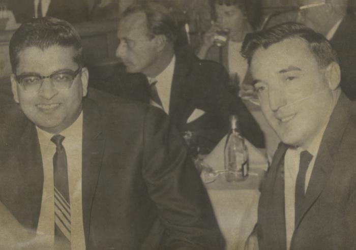 [Photo of Herb Doman and an unidentified man at an unidentified dinner]