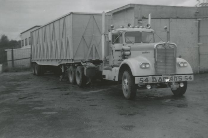 [Photo of Doman Industries transport truck no. 54]