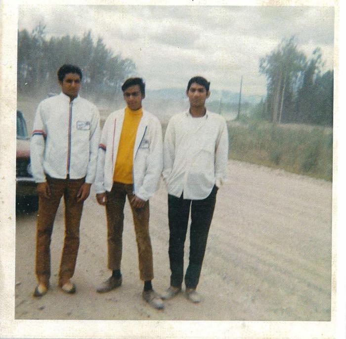 [Group photo with Rajinder Singh Gill and unidentified South Asian men]