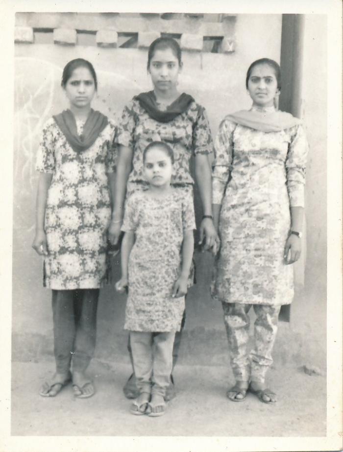 [Group photo of Rajinder Singh Gill with wife]