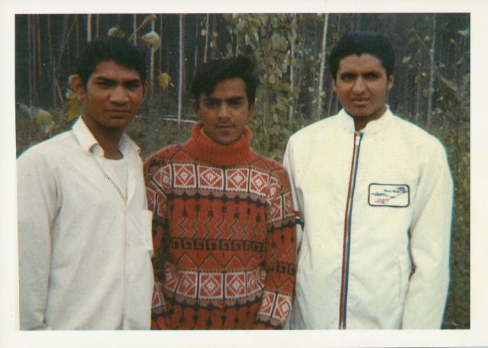 [Group photo of Rajinder Singh Gill with sawmill worker friends]