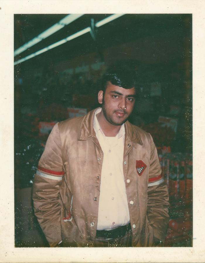 [Photo of Rajinder Singh Gill inside a mill]