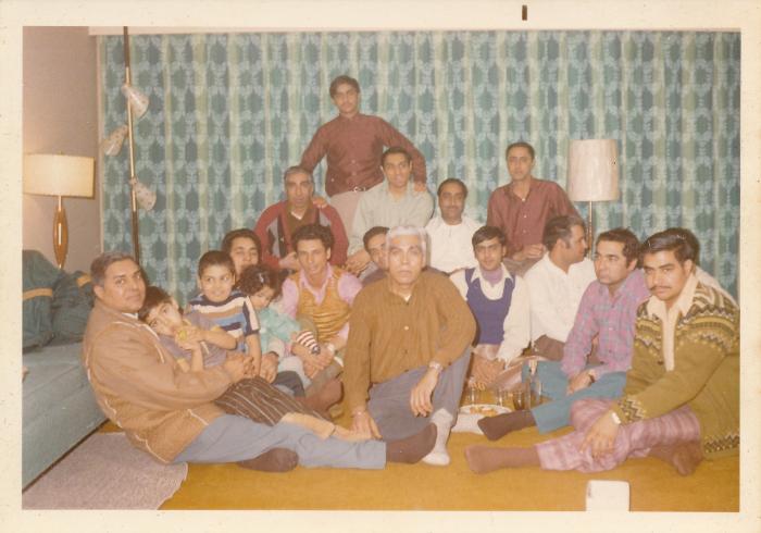 [Group photo of Rajinder Singh Gill with sawmill worker friends]