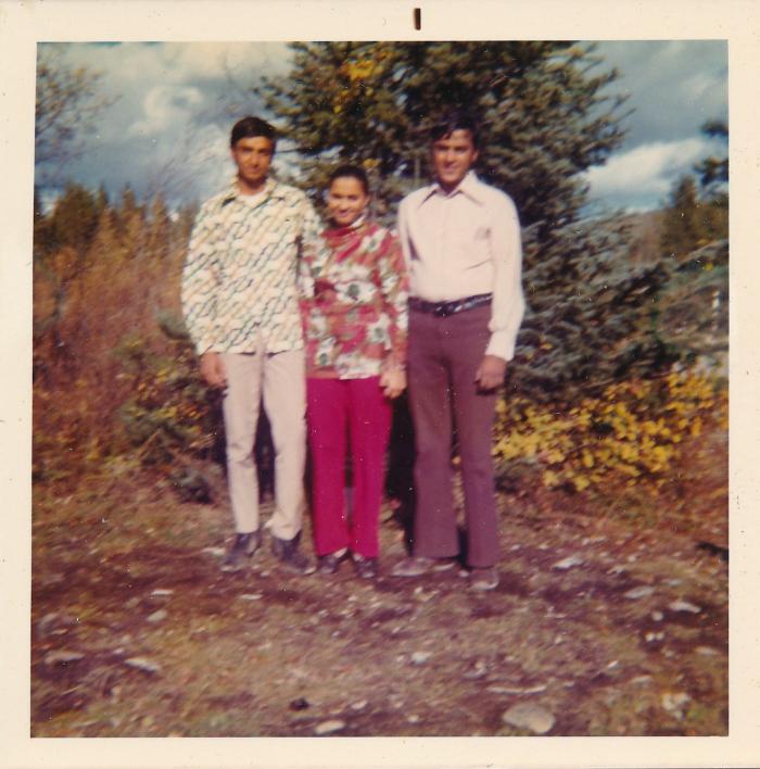 [Group photo of Rajinder Singh Gill, Manjit Gill, and brother]