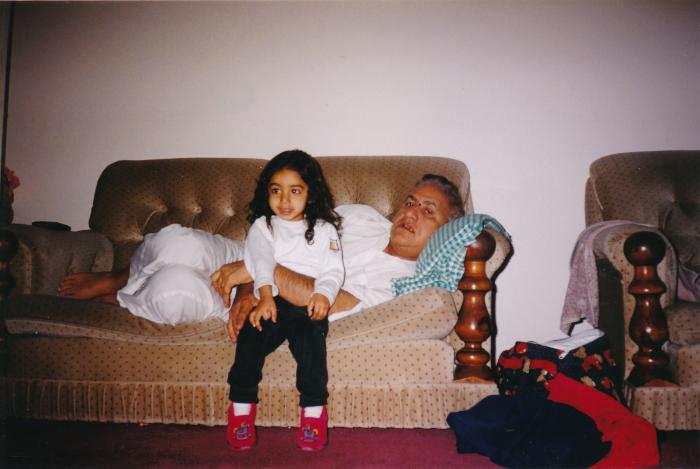 [Photo of Ranjit Singh Nut with his granddaughter]
