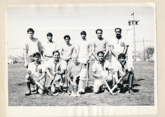 [Group photo of Sohan Labh and a field hockey team]