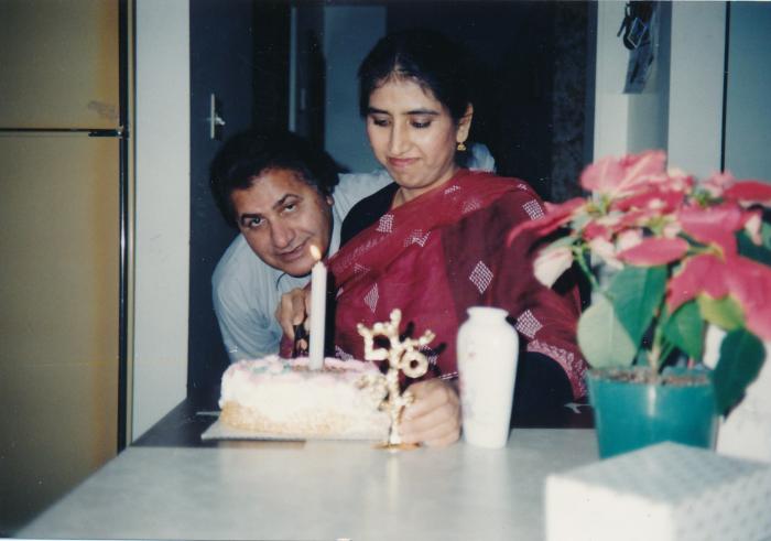 [Photo of Ranjit Singh Nut and Malkiat Kaur celebrating her birthday]