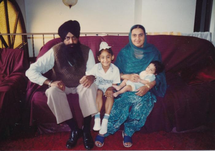 [Group photo of Rajinder Singh Gill with family]