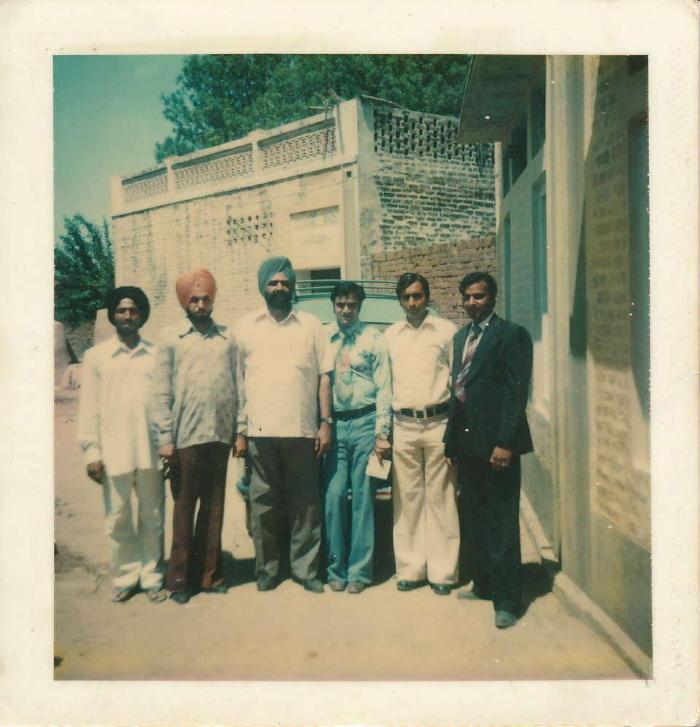 [Group photo of Rajinder Singh Gill with other unidentified South Asian men in India]