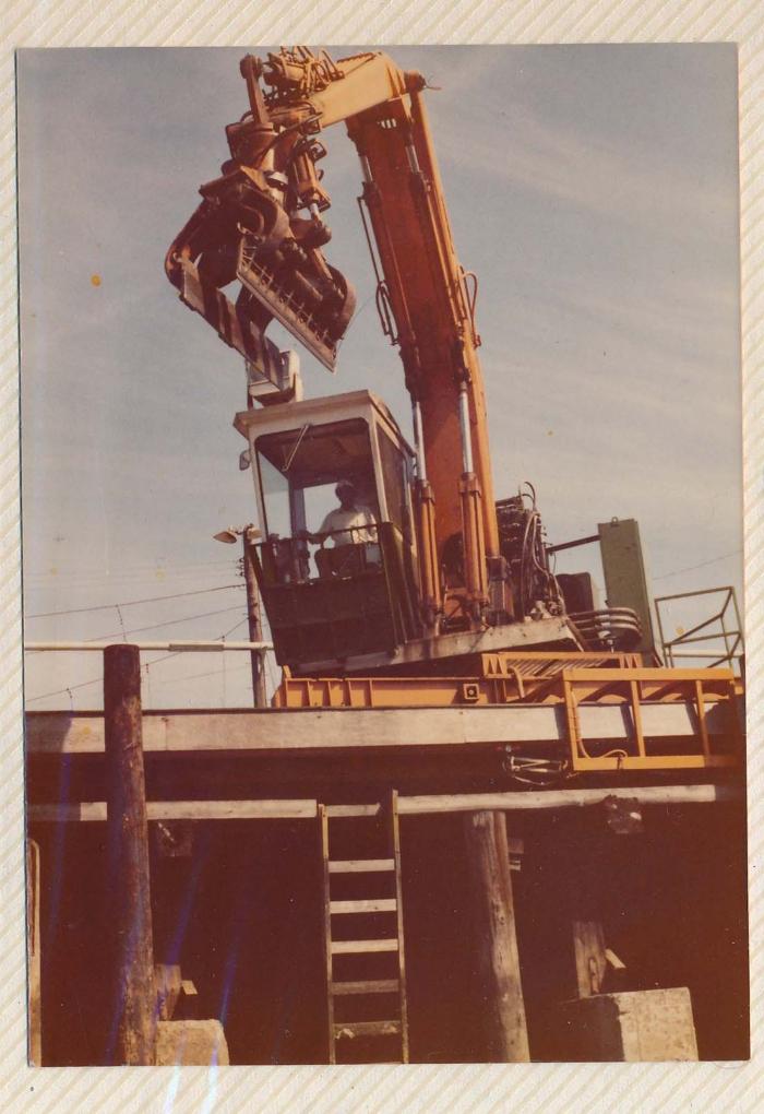 [Photo of Sohan Singh Labh as a crane operator]