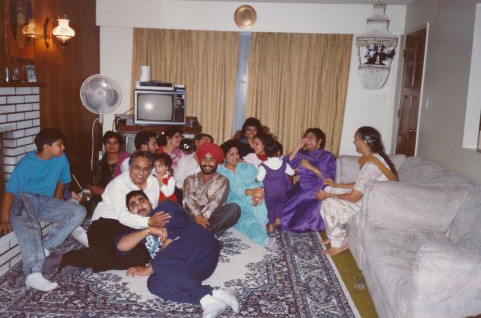 [Group photo of Sukhwinder Bolla with unidentified South Asians]