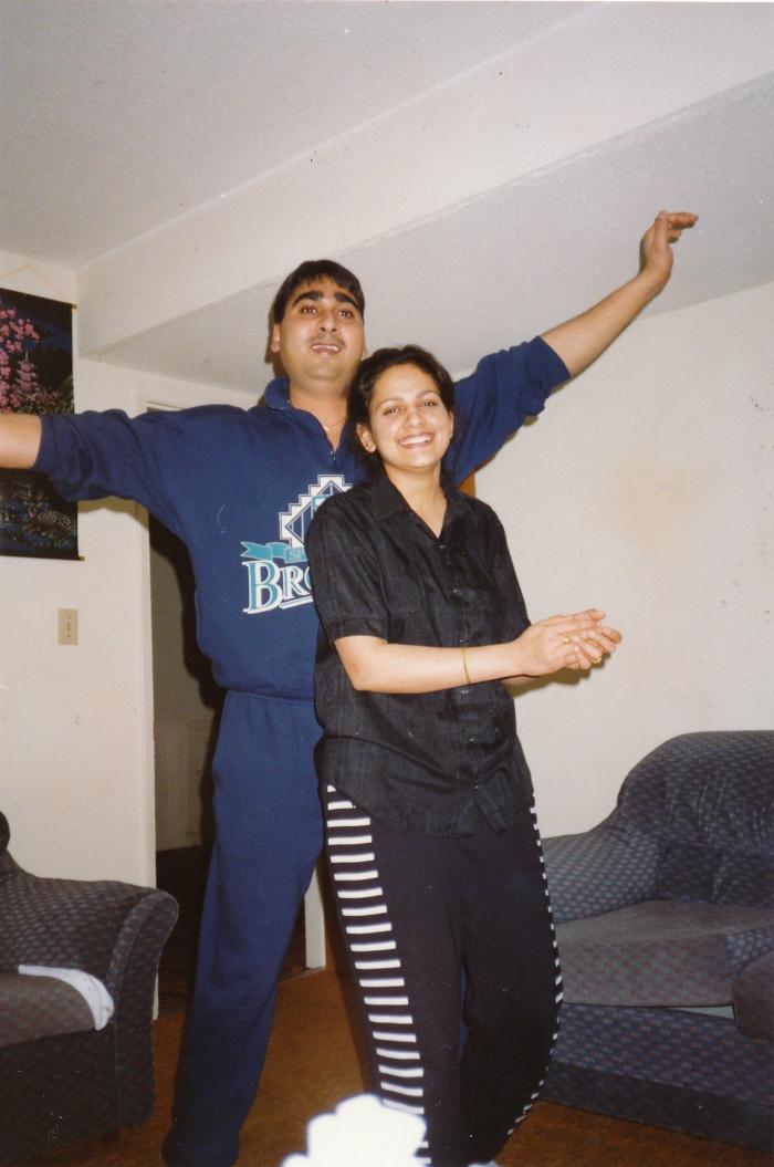 [Photo of Sukhwinder Bolla with wife]
