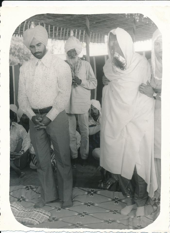 [Photo of Surjit Singh Tatla and Charanjit Kaur Tatla on their wedding day]
