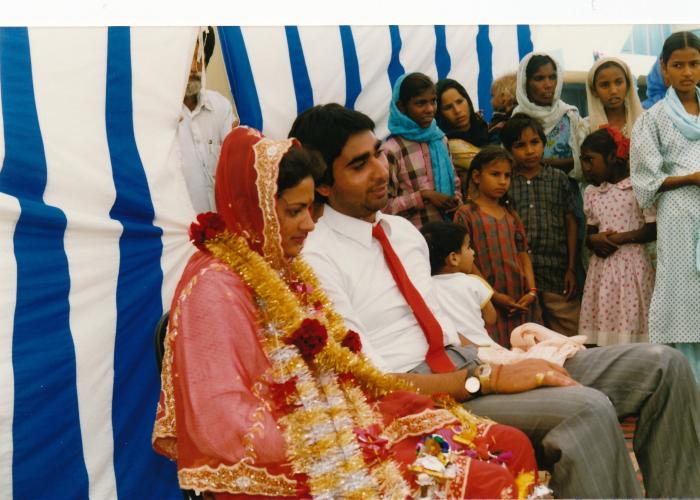 [Photo of Sukhwinder Bolla and an unidentified bride on their wedding day]