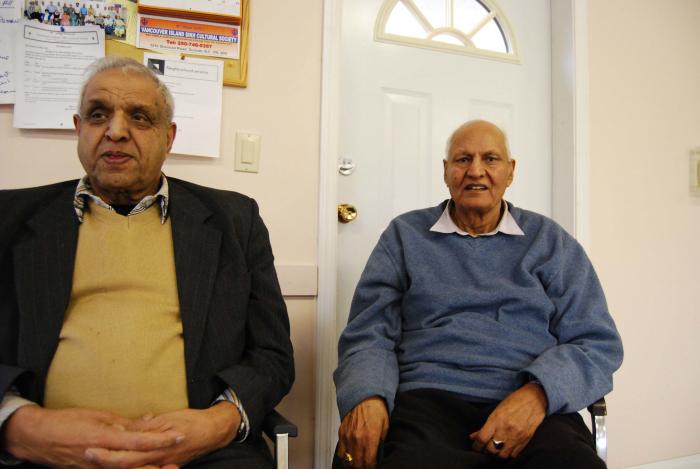 [Photo of Surjit Samra with an unidentified South Asian man]