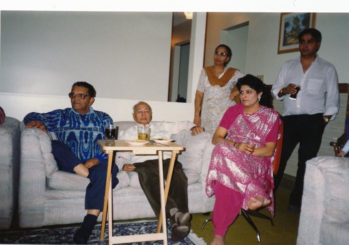 [Group photo of Sukhwinder Bolla with unidentified South Asians]
