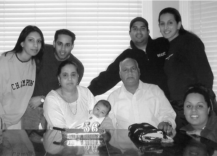 [Photo of Surjit Singh Tatla with his family on Charanjit Tatla's 56th birthday]