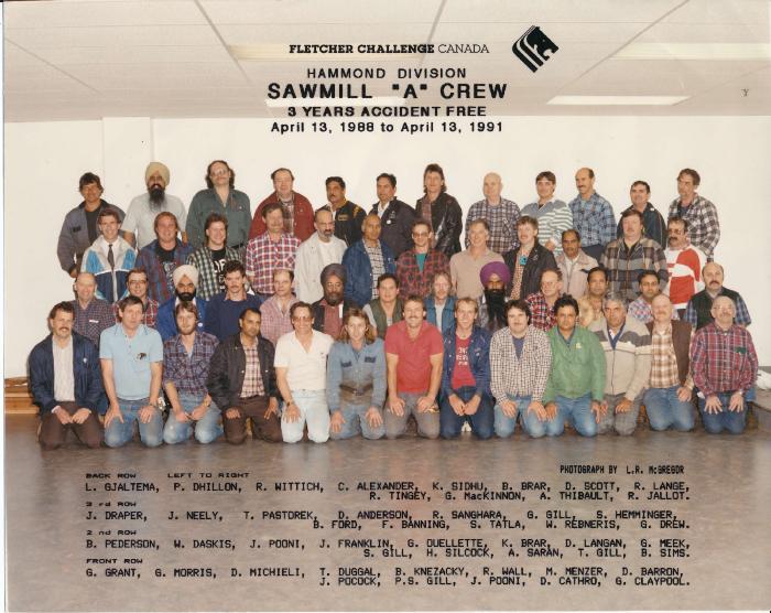 [Group photo of Surjit Singh Tatla with Hammond sawmill workers]