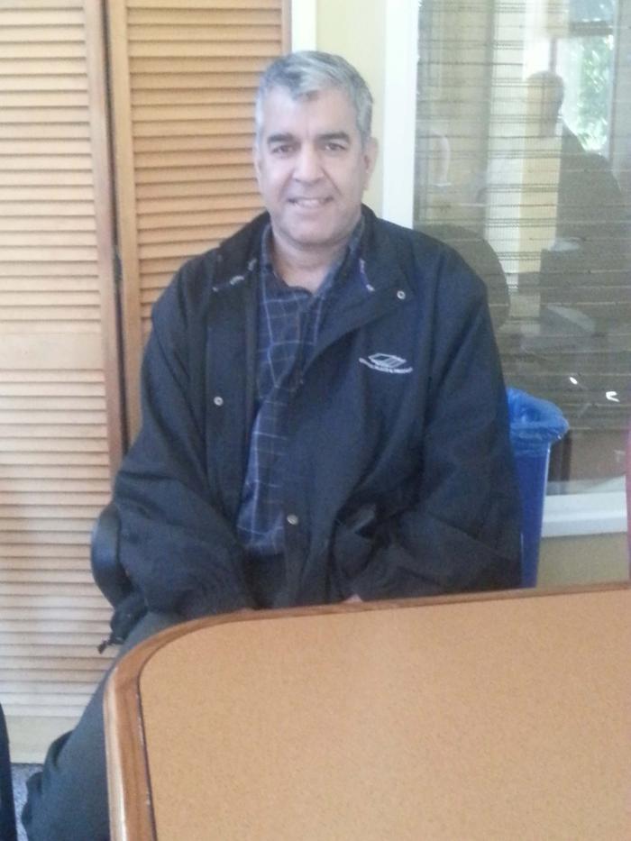 [Photo of Sukh Cheema]