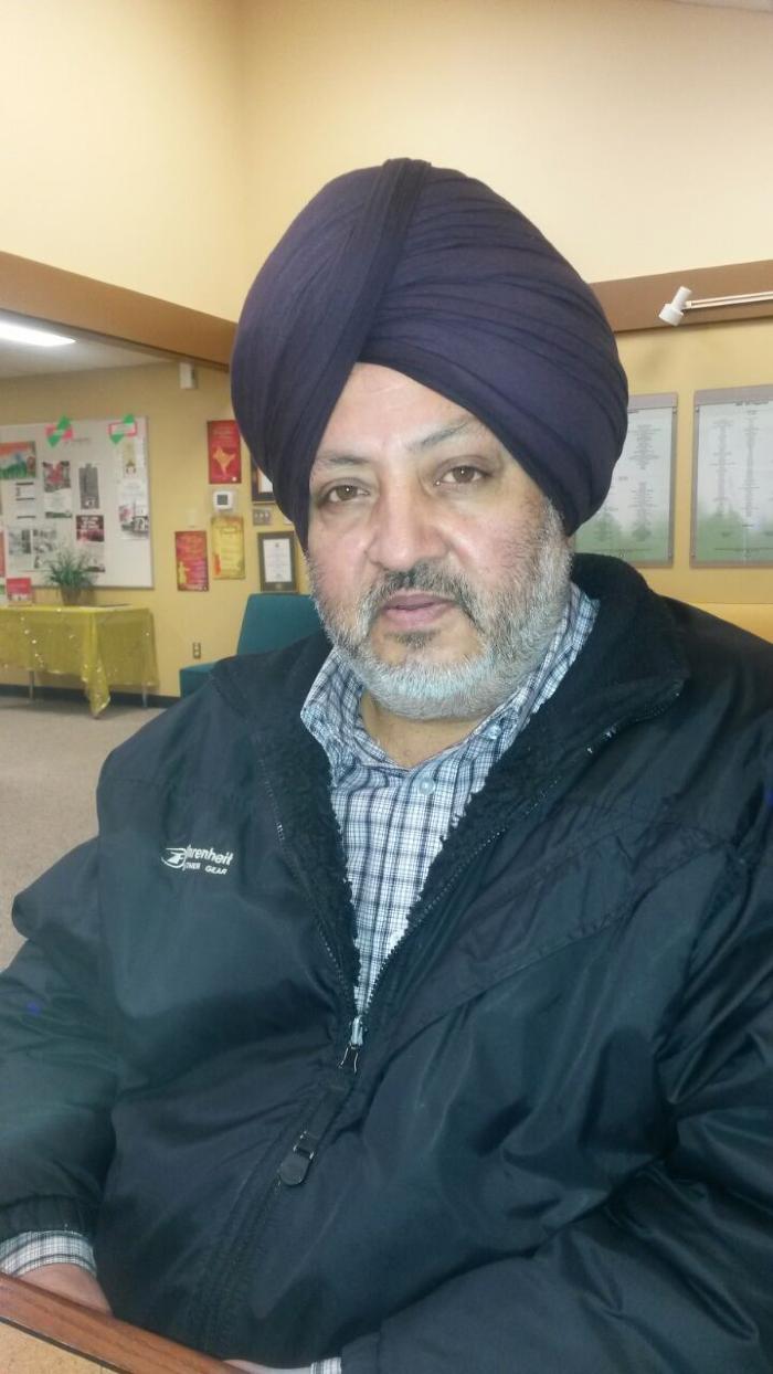 [Photo of Tarlochan Singh Lally]