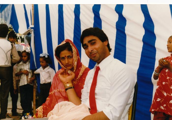 [Photo of Sukhwinder Bolla and an unidentified bride on their wedding day]