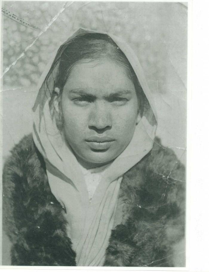 [Photo of an unidentified woman]