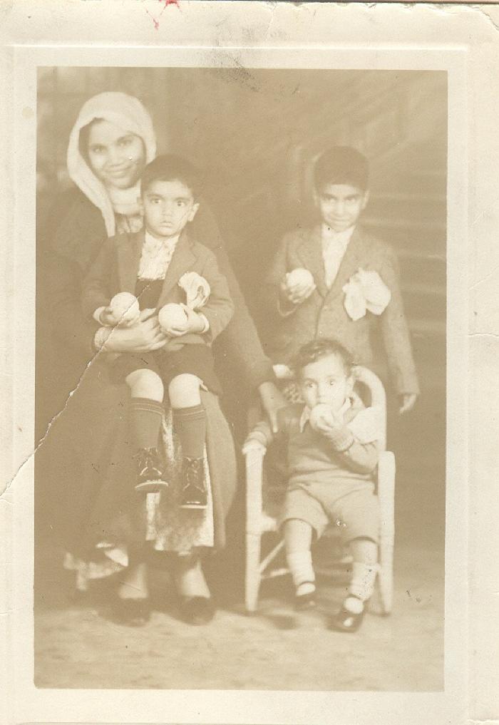 [Group photo of Tante Kaur and her three children]