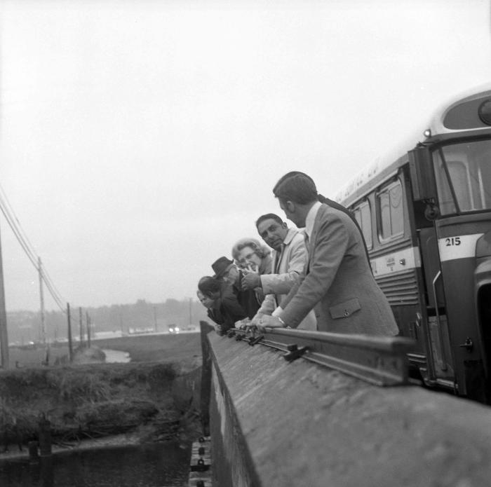 [Group photo of Sarjit "Mac" Singh and others during a tour of the Elgin dam]