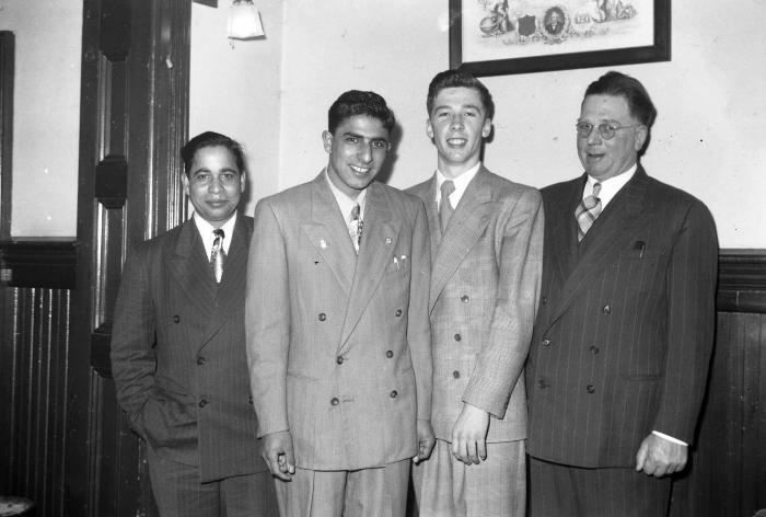 [Group photo of Sarjit "Mac" Singh and Bob Bose at Jay Cee Meeting]