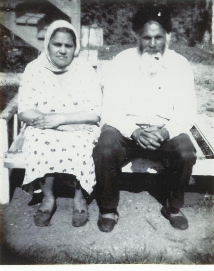 [Photo of an unidentified man and woman]