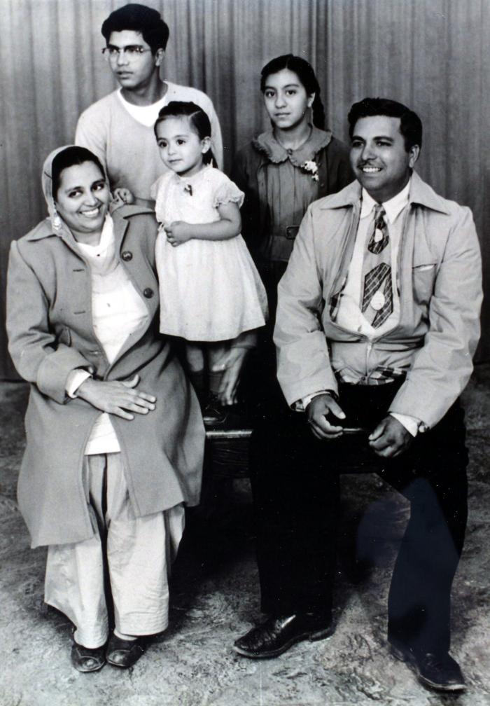 [Photo of Gill family]