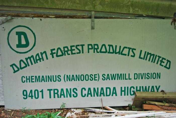 [Photo of a Doman Forest Products Ltd. sign]