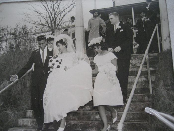 [Photo of George and Jeto on their wedding day]