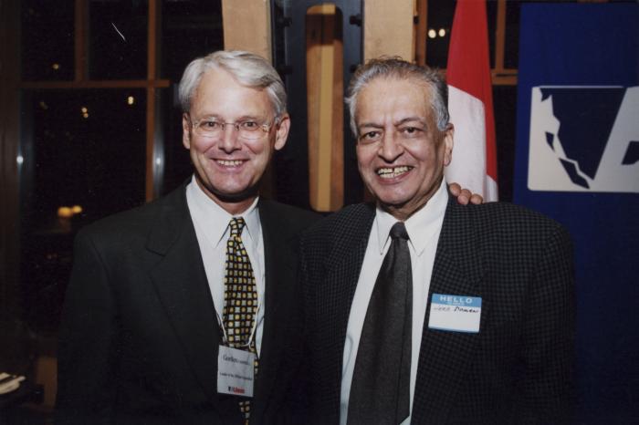 [Photo of Herb Doman and Gordon Campbell]