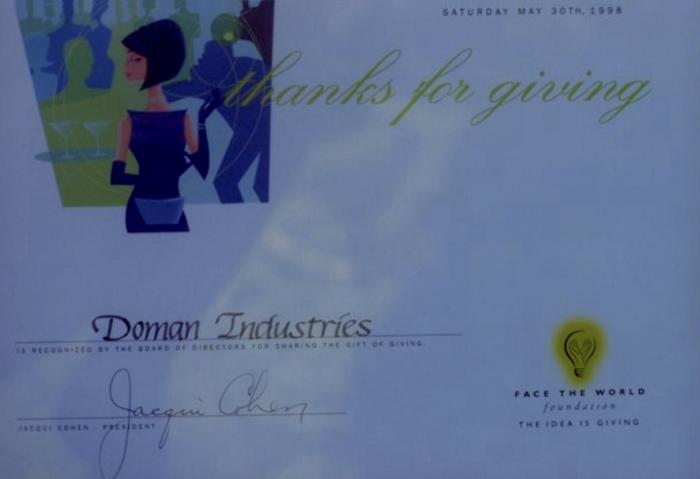 [Award presented by Face the World Foundation to Doman Industries Limited in 1998]