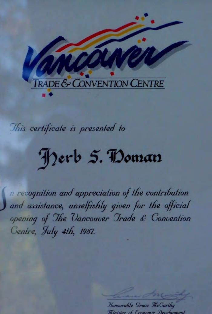 [Award presented by Grace McCarthy to Herb Doman for his involvement in the opening of the Vancouver Trade and Convention Centre]