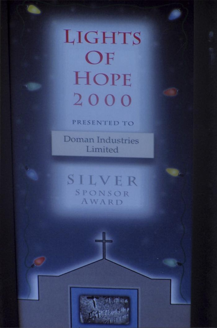 [Silver Sponsor Award presented by Lights of Hope to Doman Industries Limited in 2000]