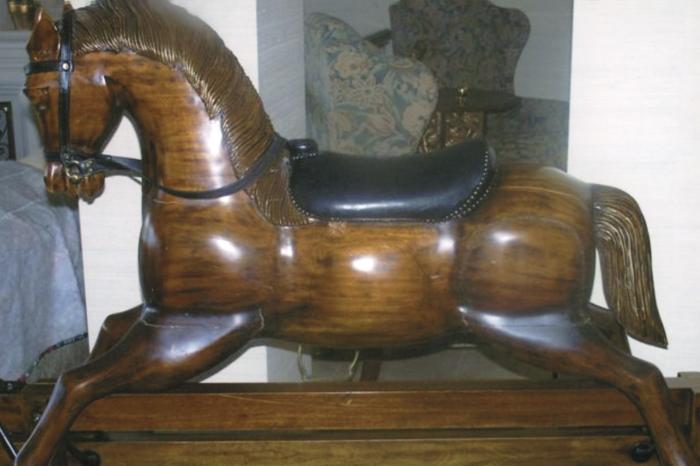 [Wooden rocking horse]