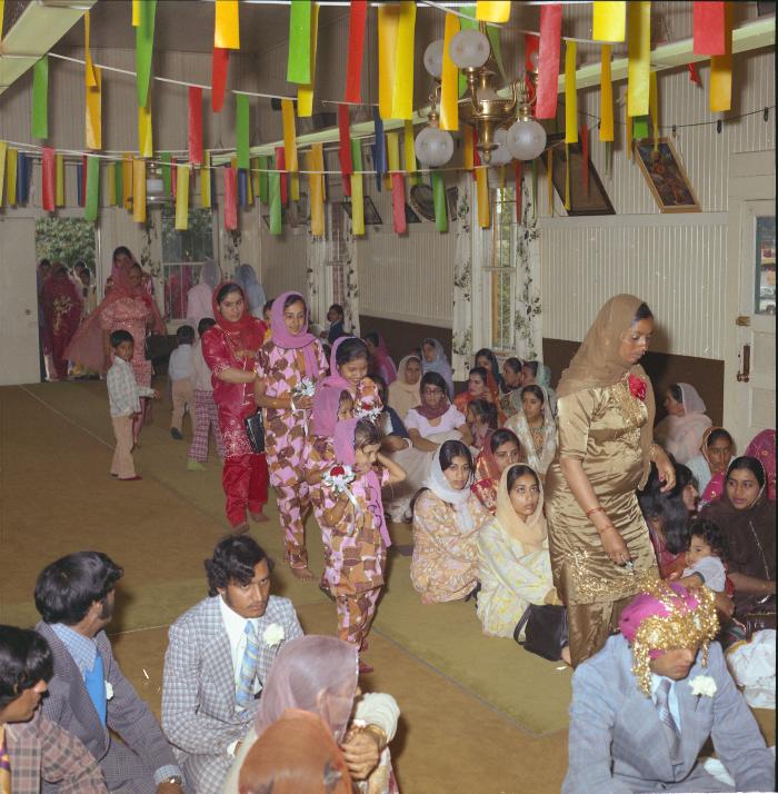 [Photo of Baldave Sidhu and wedding guests]