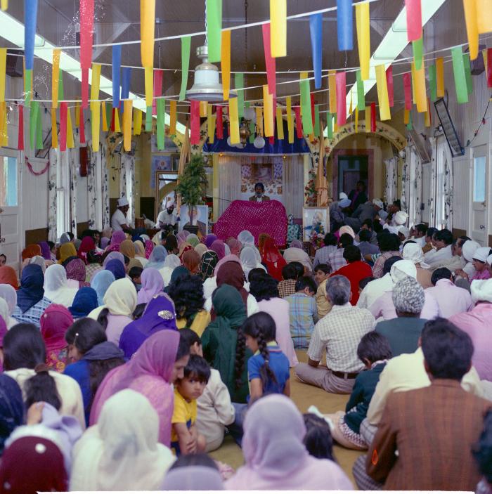 [Photo of wedding guests at Gurdwara]