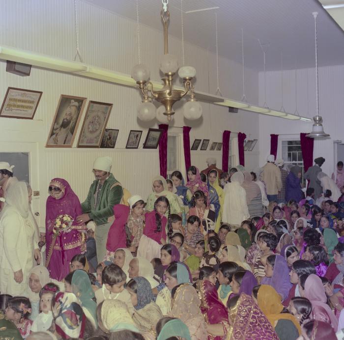 [Photo of Chindo Sidhu and the wedding guests]