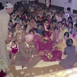 [Photo of Surinder Gill, G.K. Sidhu and their wedding guests]
