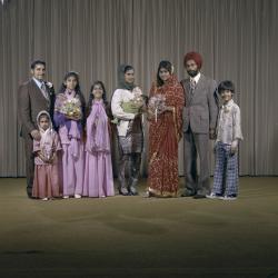 [Photo of Malkit S. Sidhu and the wedding guests]