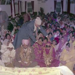 [Photo of Surinder Gill, G.K. Sidhu and the wedding guests]