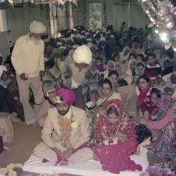 [Group photo of Surinder Sidhu, Manjit Sidhu and the wedding guests]