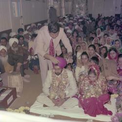 [Photo of Surinder Sidhu, Manjit Sidhu and the wedding guests]