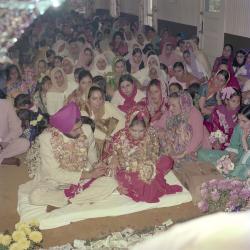 [Photo of Manjit Sidhu and the wedding guests]