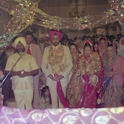 [Photo of Gavar Singh, an unidentified bride and wedding guests]