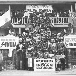[Group in front of New Westminster Temple celebrating Indian independence]