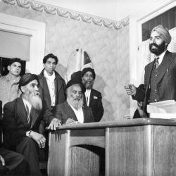 [Naginder Singh Gill speaks at meeting in Sikh Temple office - 1866 West 2nd Avenue]